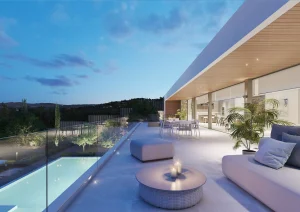 Salón abierto a la terraza exterior de una de las residencias de lujo Can Aubarca en Ibiza diseñadas para Touza Arquitectos