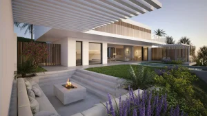 Salón abierto al exterior, con jardín piscina y fogata del proyecto Camarate diseñado para Bass Houses